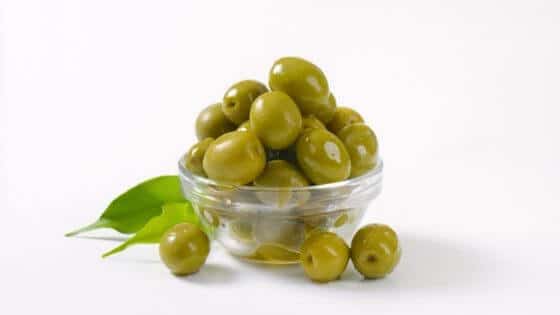 Olives on a small cup.